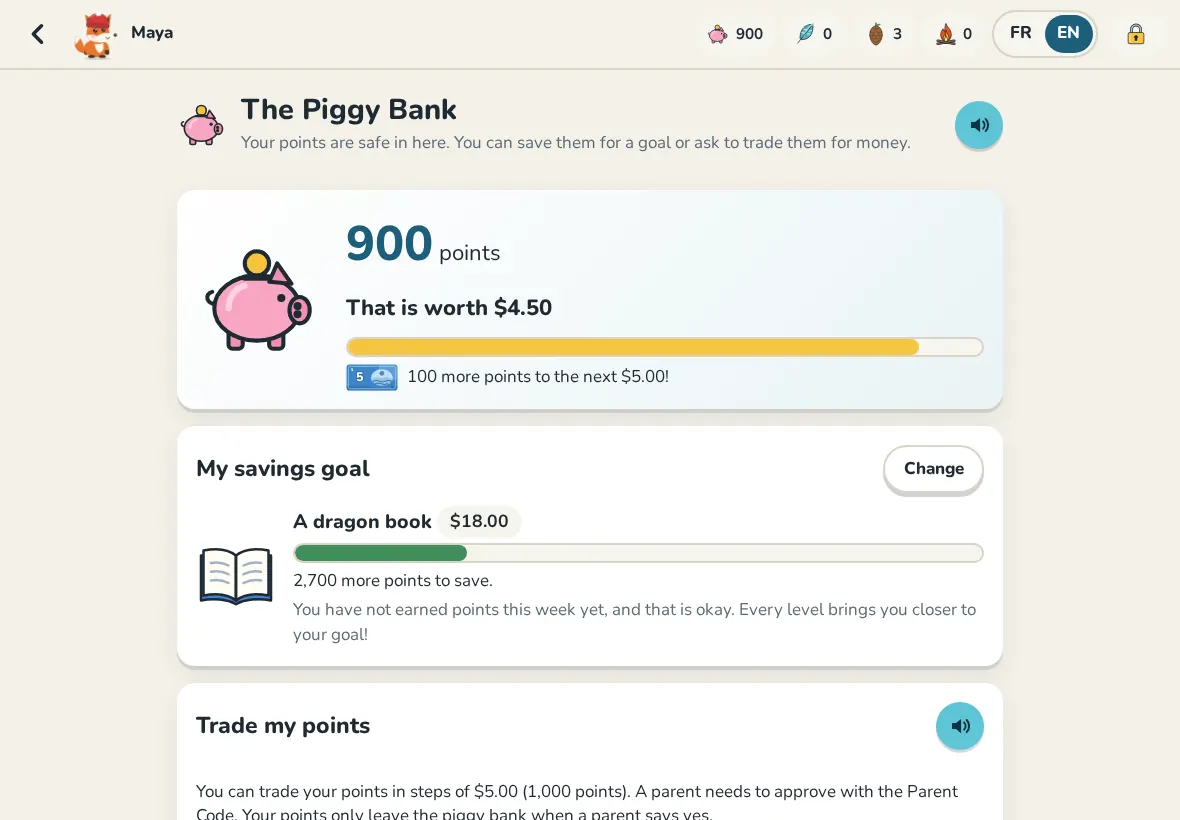 A child's piggy bank with a savings goal